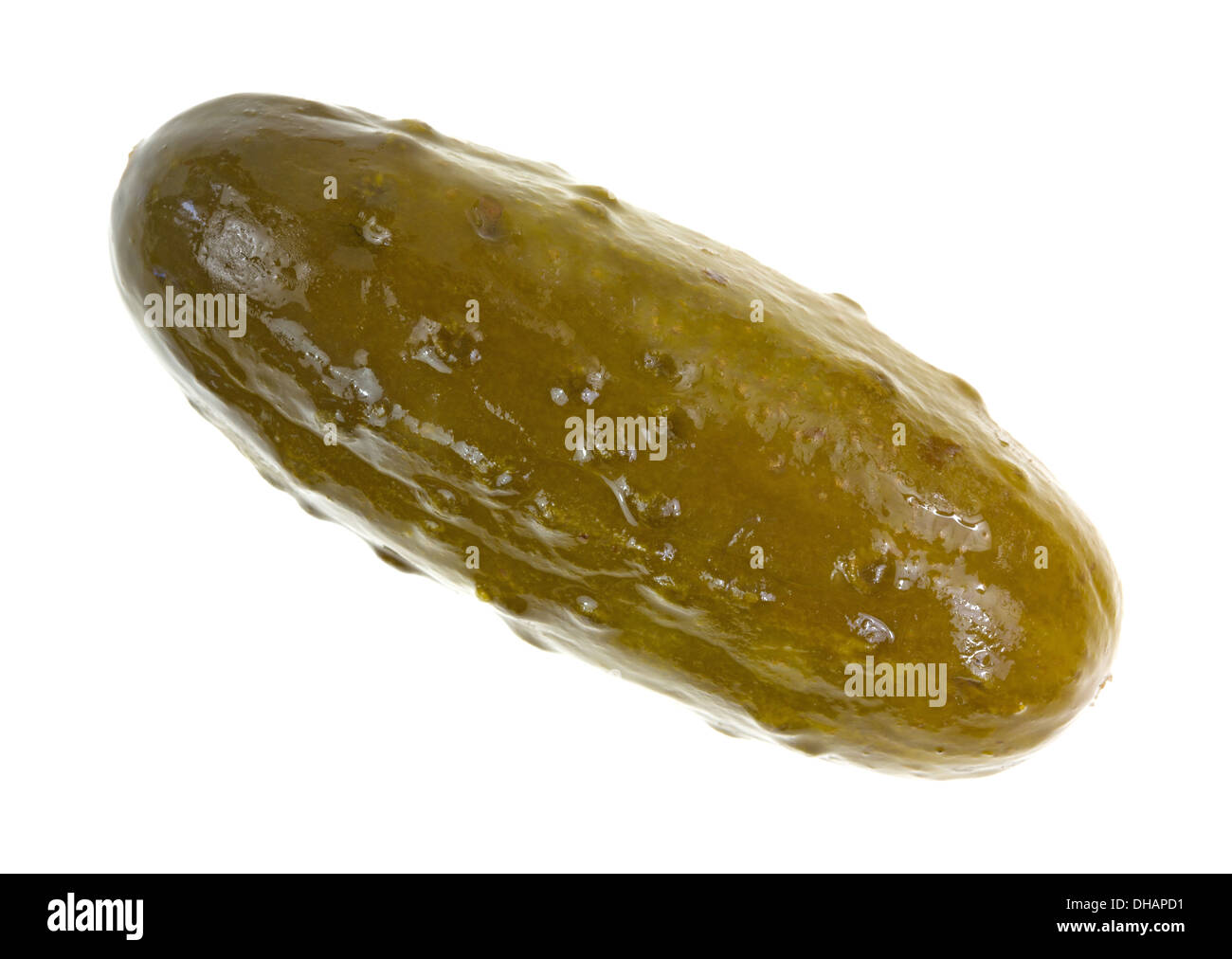 A single large dill pickle on a white background. Stock Photo