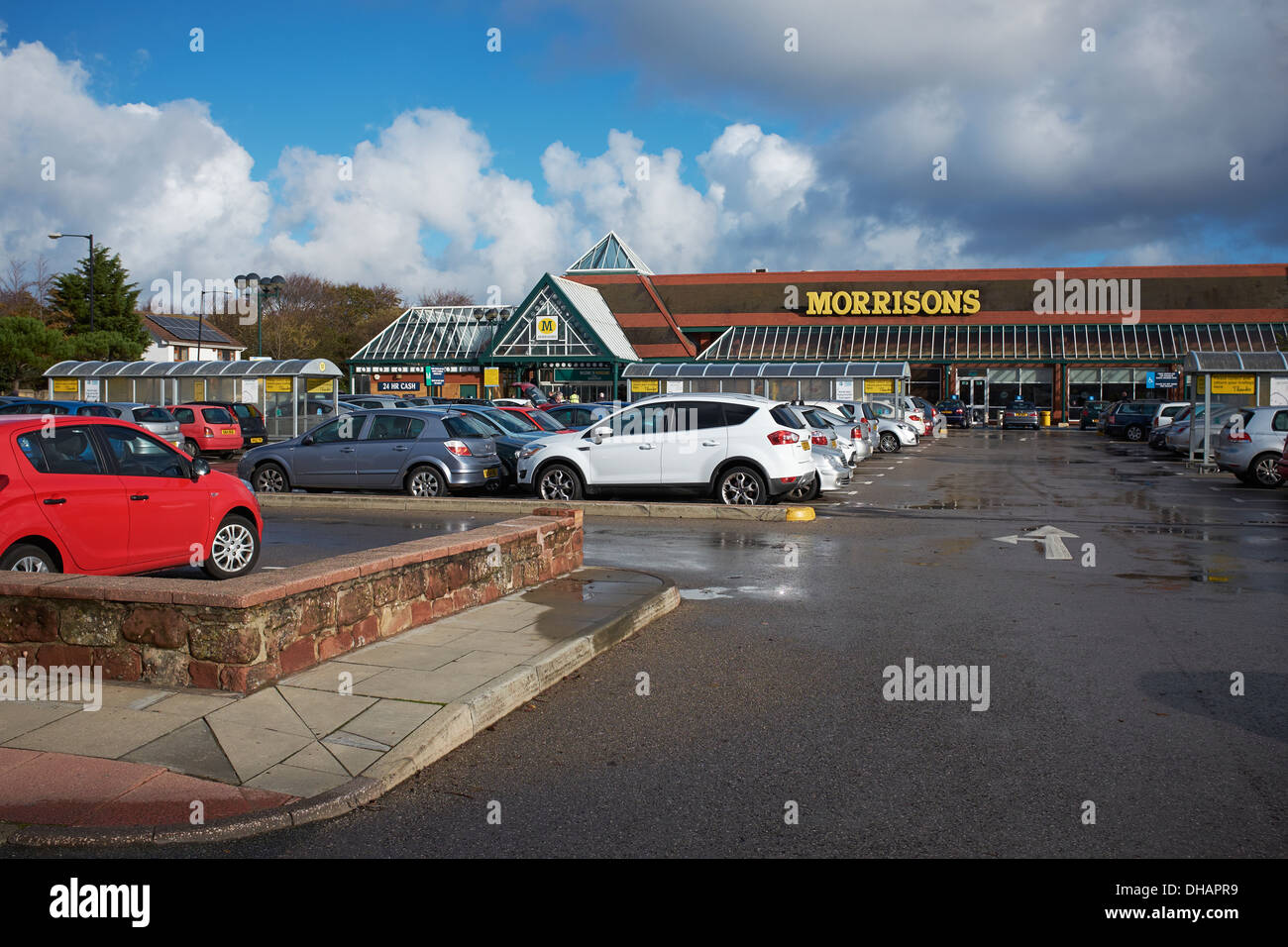 A Morrisons supermarket and car park in West Kirby on the Wirral UK Stock Photo