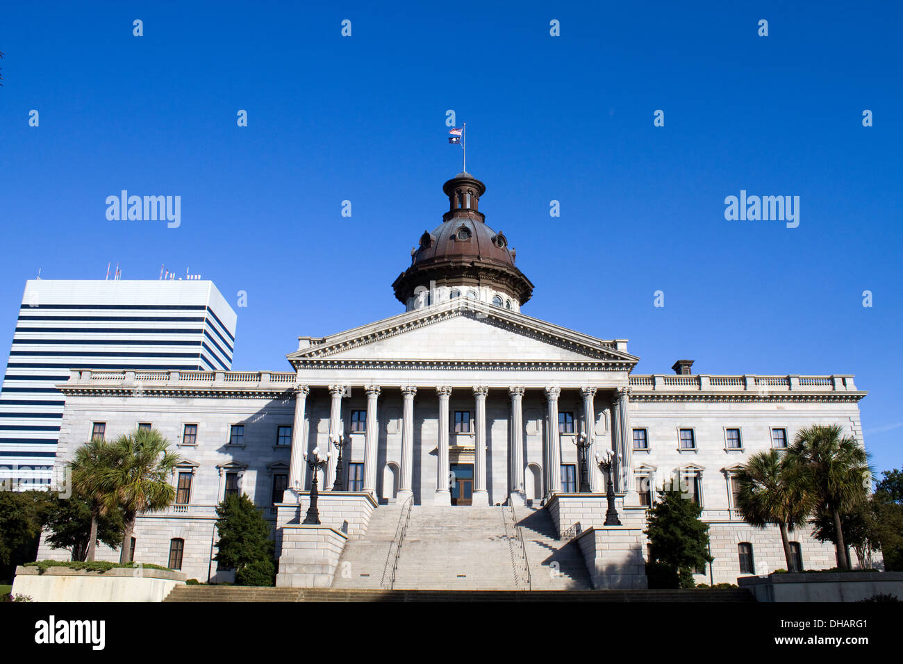 Capital building in Columbia, South Carolina with modern city building in the background. Stock Photo