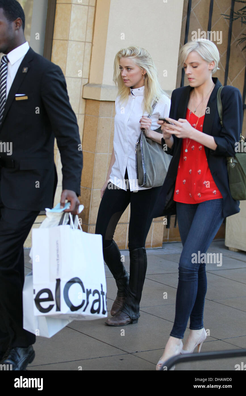Amber Heard and her sister Whitney Heard are seen walking together