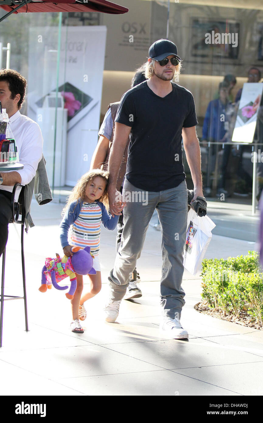 Gabriel Aubry and his daughter Nahla Aubry are seen walking through