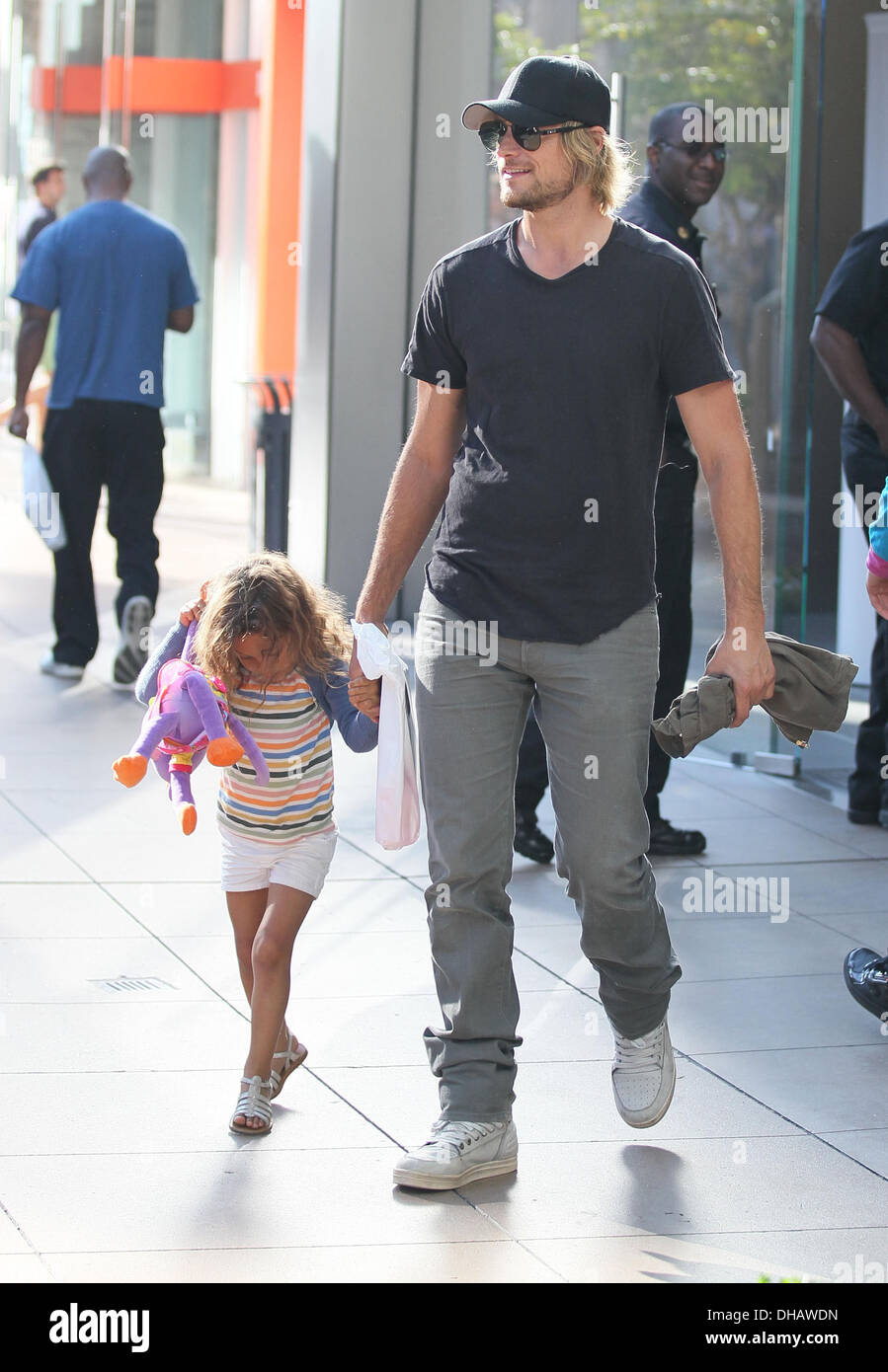 Gabriel Aubry and his daughter Nahla Aubry are seen walking through