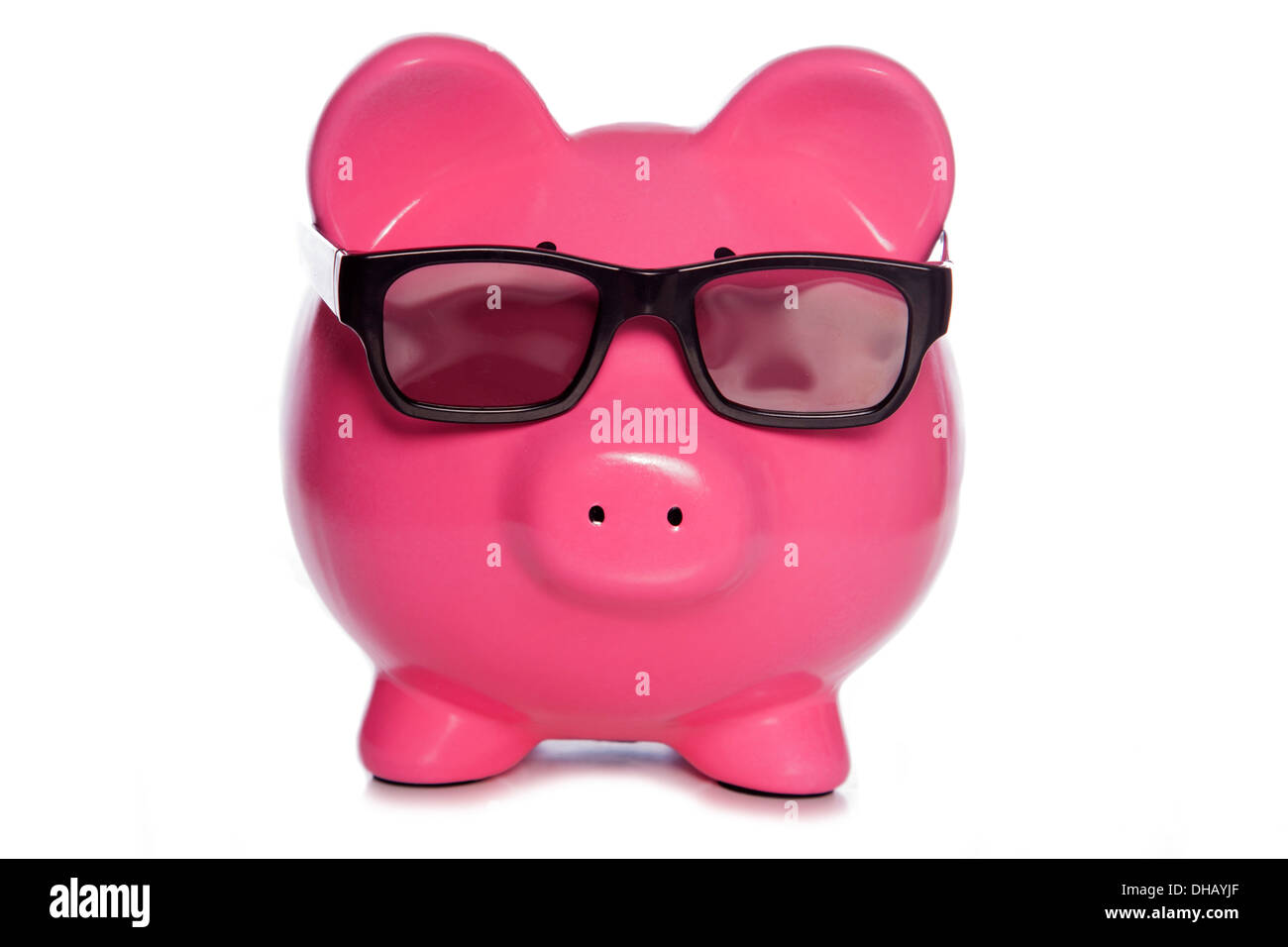 Piggy bank wearing 3D glasses studio cutout Stock Photo - Alamy