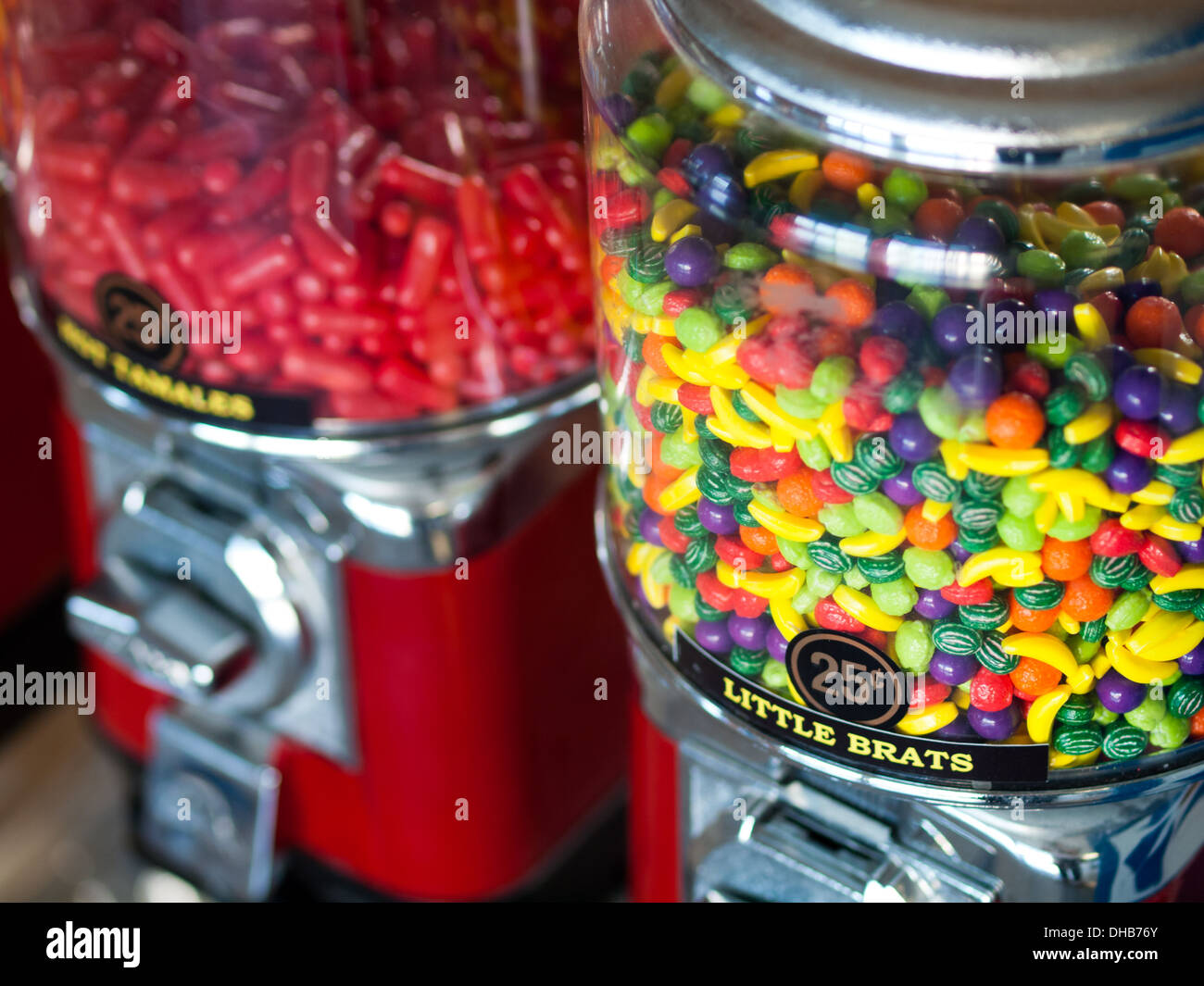 Little Brats and Hot Tamales candy in candy machines. Stock Photo
