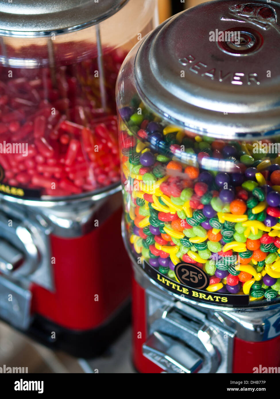 Little Brats and Hot Tamales candy in candy machines. Stock Photo