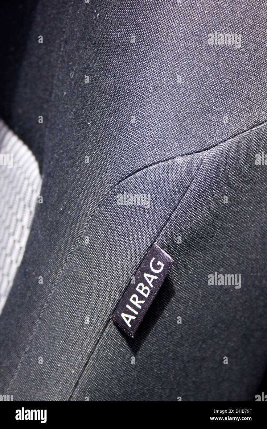 close up of side airbag tag sewn into automobile seat Stock Photo