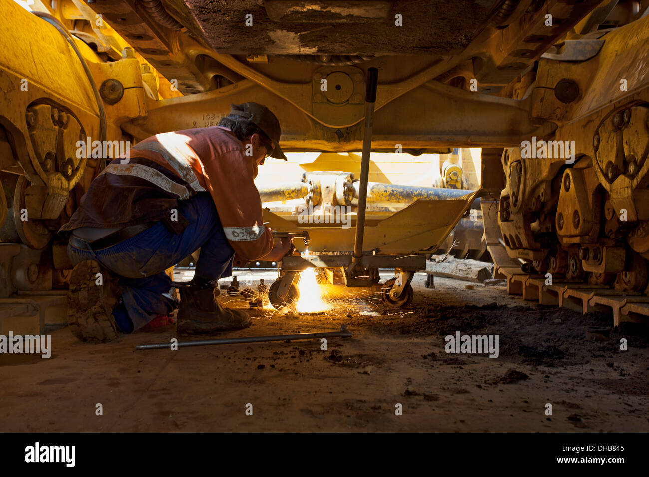 Mining in Africa. Cutting torch. Repair work on large mine equipment
