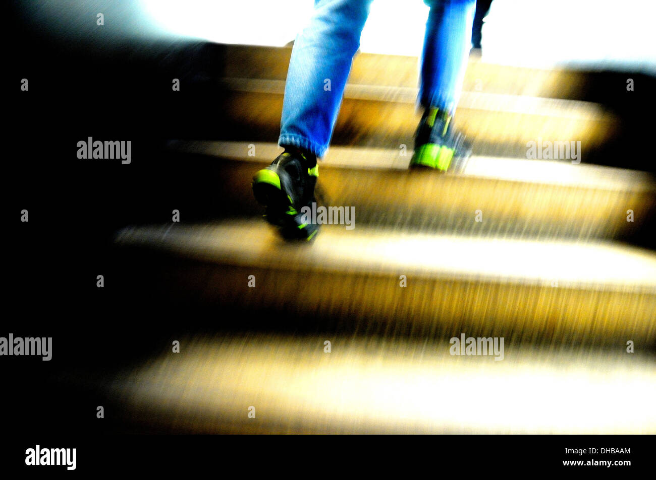 Running upstairs Stock Photo Alamy