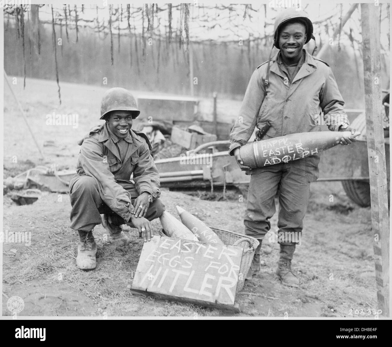 Easter morning, T-5 William E. Thomas...and Pfc. Joseph Jackson...will roll specially prepared eggs on Hitler's lawn. , 531253 Stock Photo