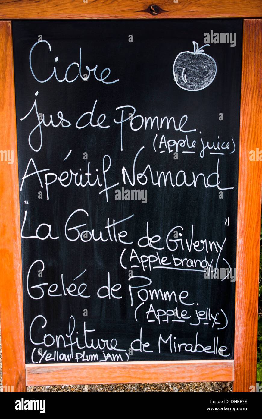 Notice in Giverny France listing apple food products for sale Stock Photo