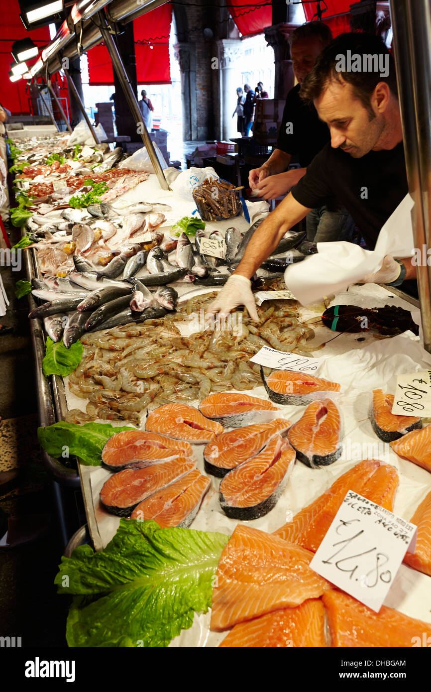 Shopping for fresh fish at the Rialto markets, Venice, Italy. Stock Photo