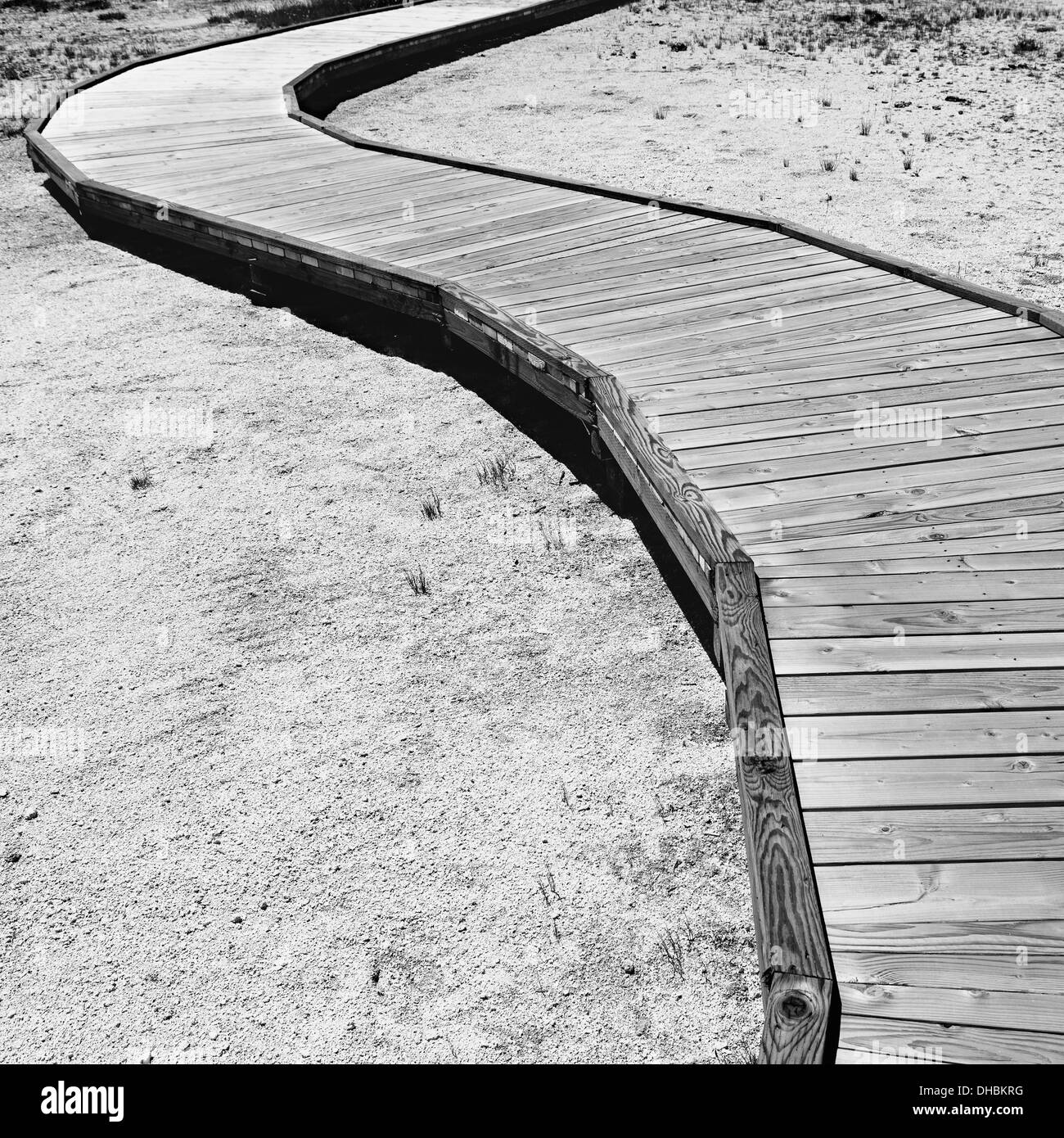 Boardwalk extending across Midway Geyser in Yellowstone National Park Stock Photo