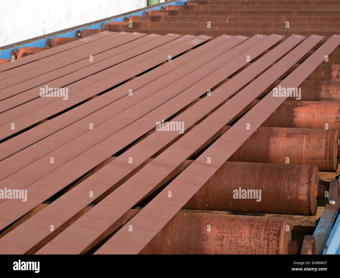 steel rollers transporting profiles Stock Photo