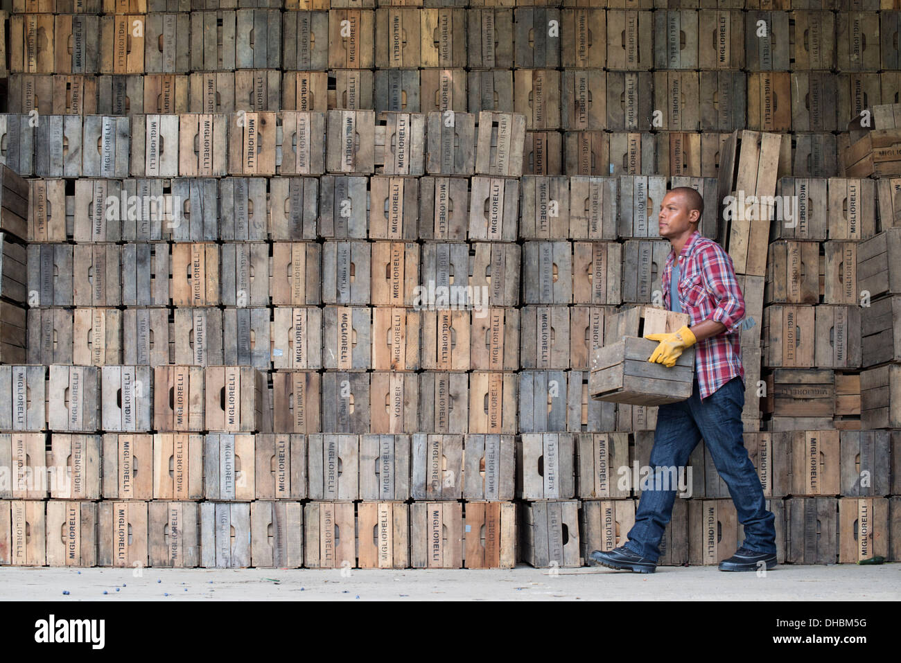 A farmyard. A stack of traditional wooden crates for packing fruit
