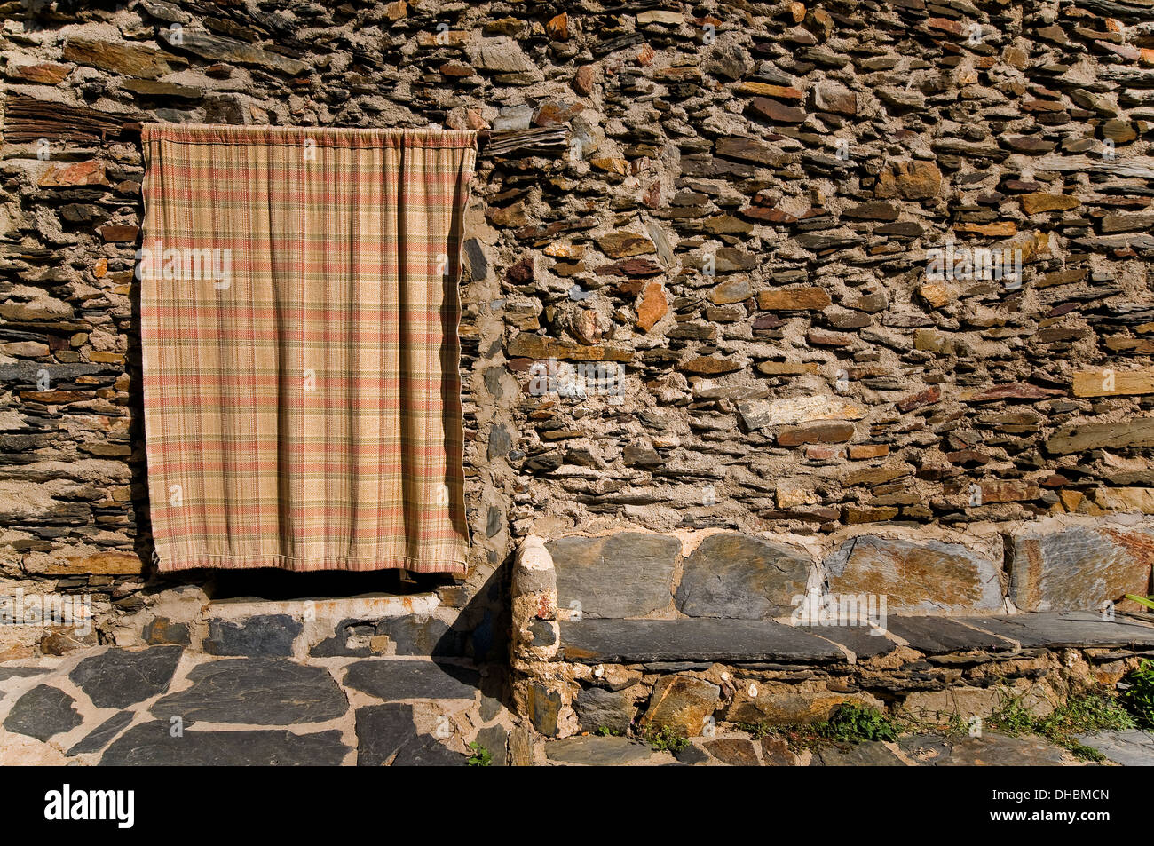 Entry with a curtain in a ancient house Stock Photo