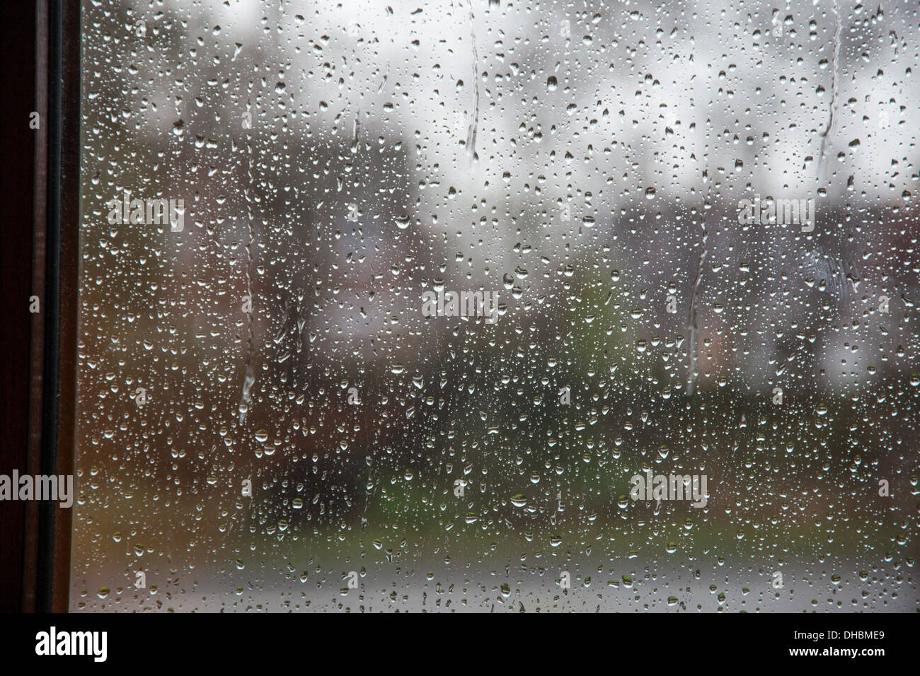 Rain drops on a glass window pane Stock Photo