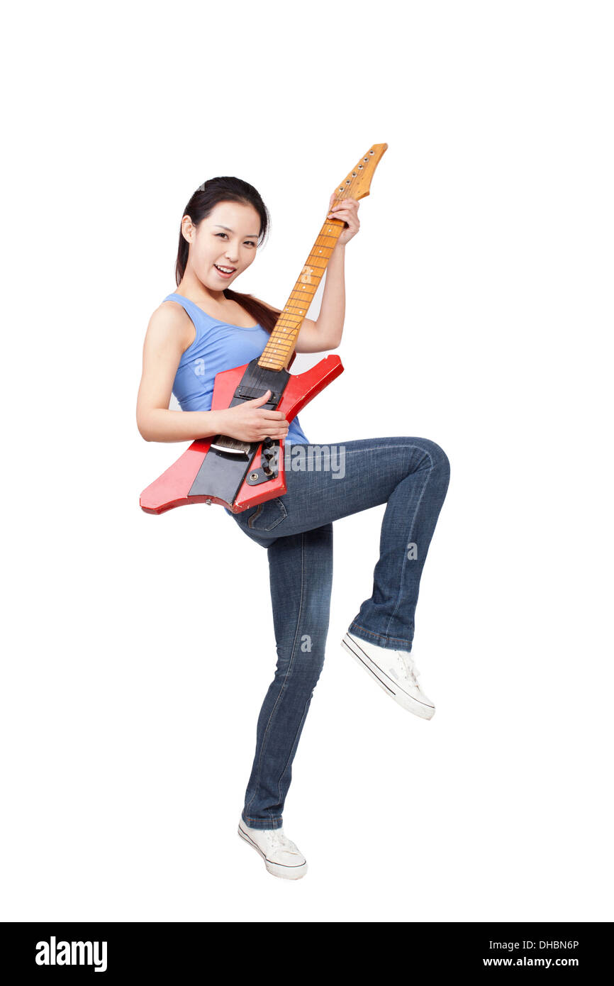 Girl holding electric guitar cut Cut Out Stock Images & Pictures - Alamy