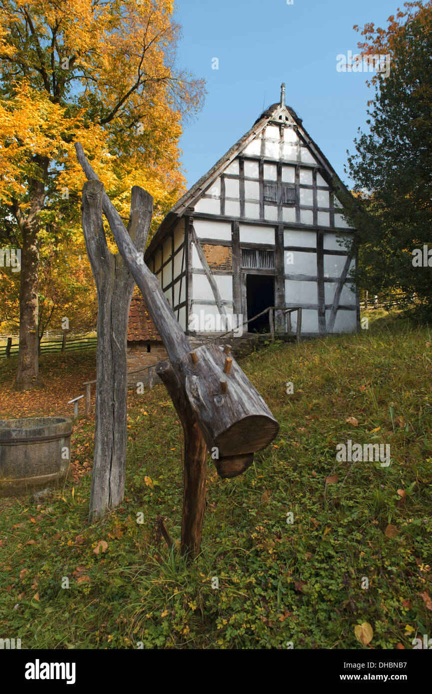 Old well in front of an old cottage house from the eighteenth century, Germany, Europe Stock Photo