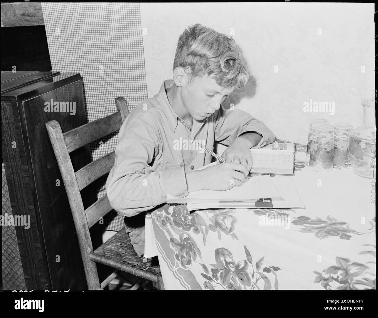 Franklin D. Sergent who is 13 years old and in the fifth grade does his homework 541349 Stock Photo