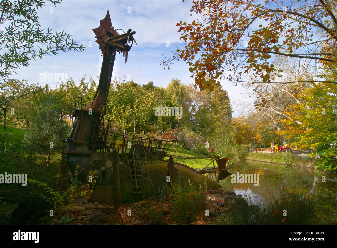 'Tholus' steampunk sculpture of a dragon by Tom Petrusson, 1993, Jardin Japonais, Toulouse, Haute-Garonne, France Stock Photo