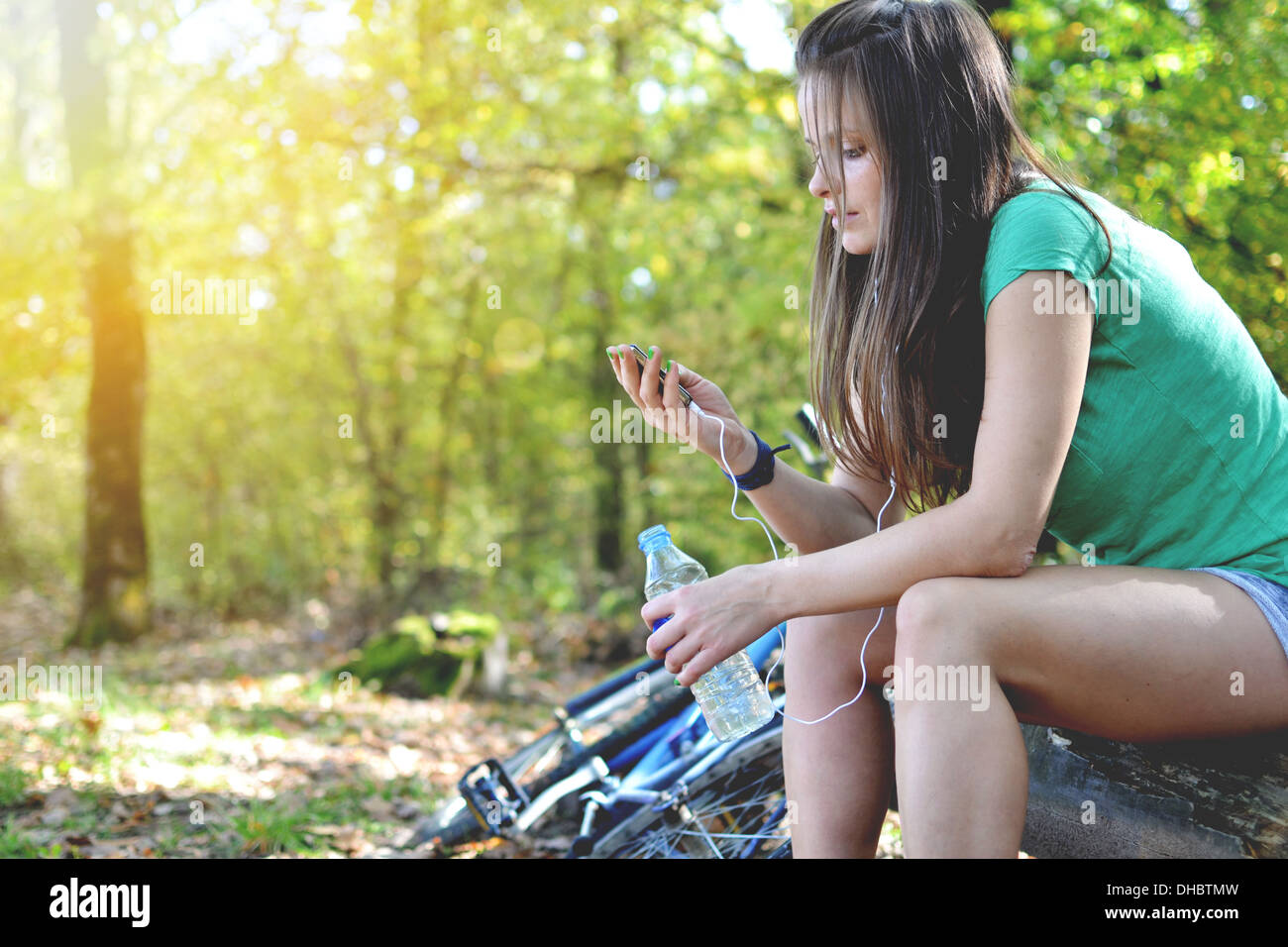 young woman with bicycle Stock Photo