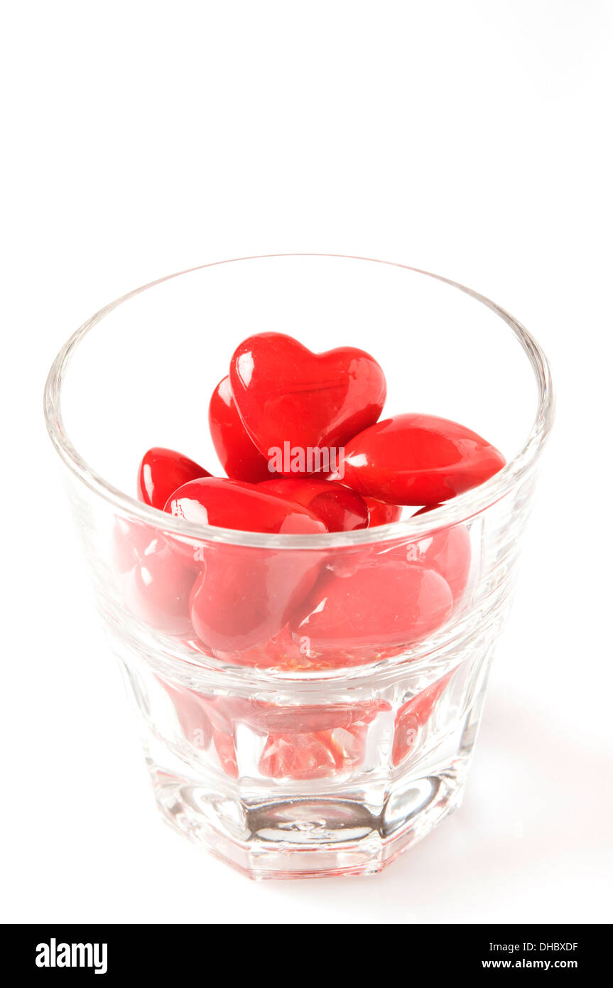valentine hearts in a glass for water, love concept Stock Photo