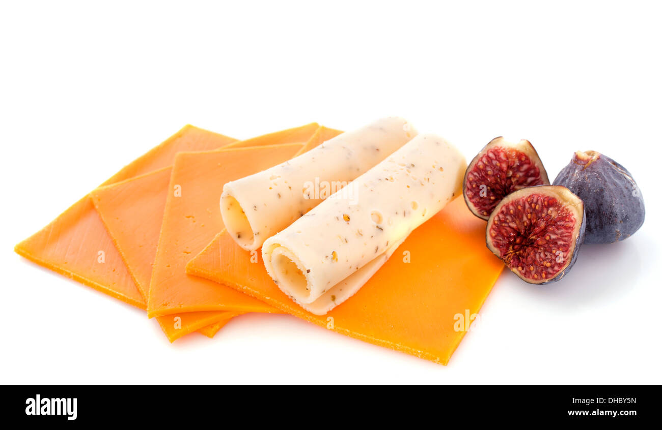 slices of mimolette and emmental in front of white background Stock Photo