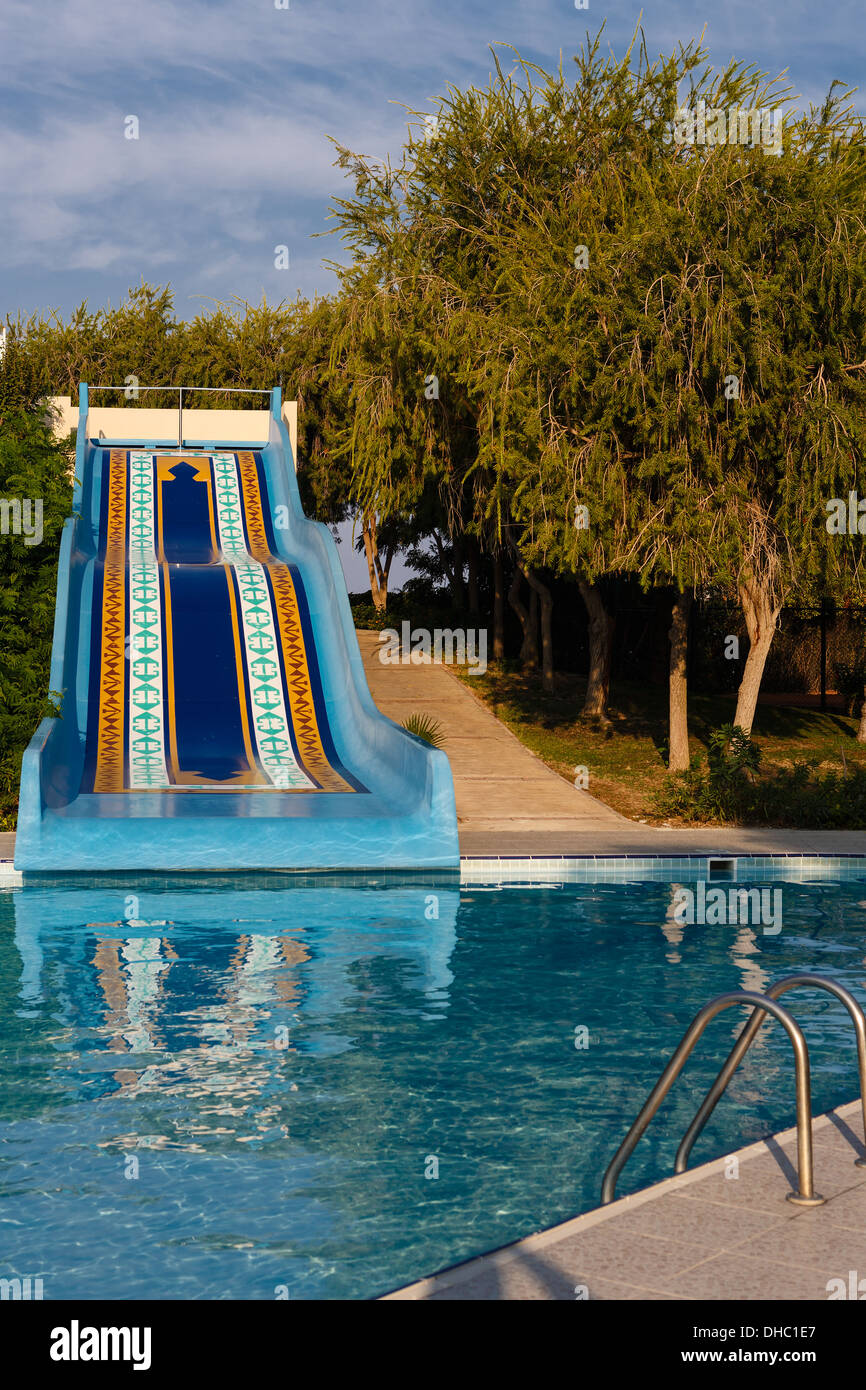 Waterslide in the swimming pool Stock Photo