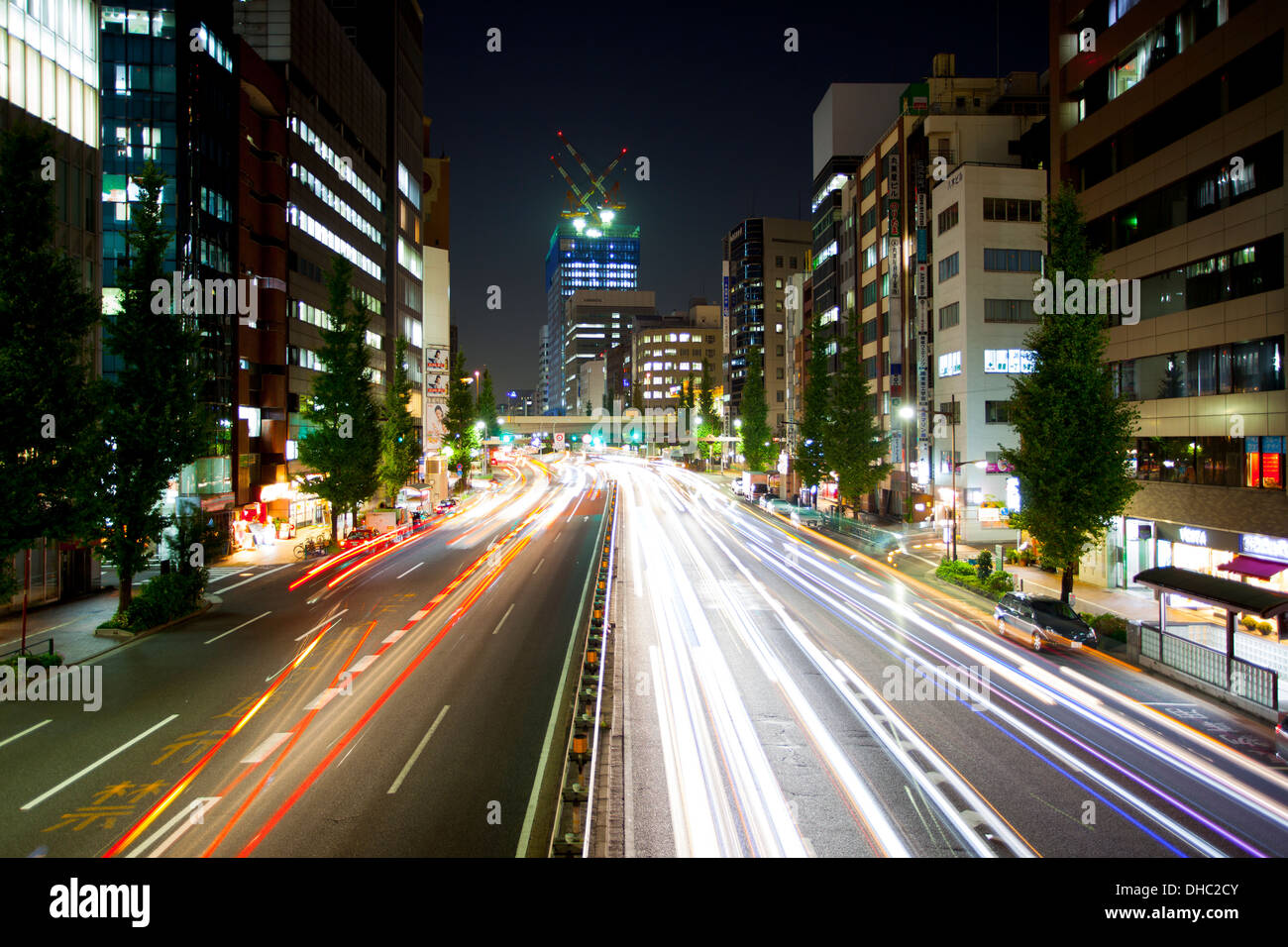 A color photograph of the traffic at night in Tokyo, Japan Stock Photo