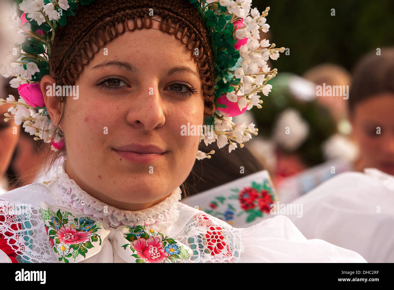 People in folk costumes on a pilgrimage to Zarosice, South Moravia