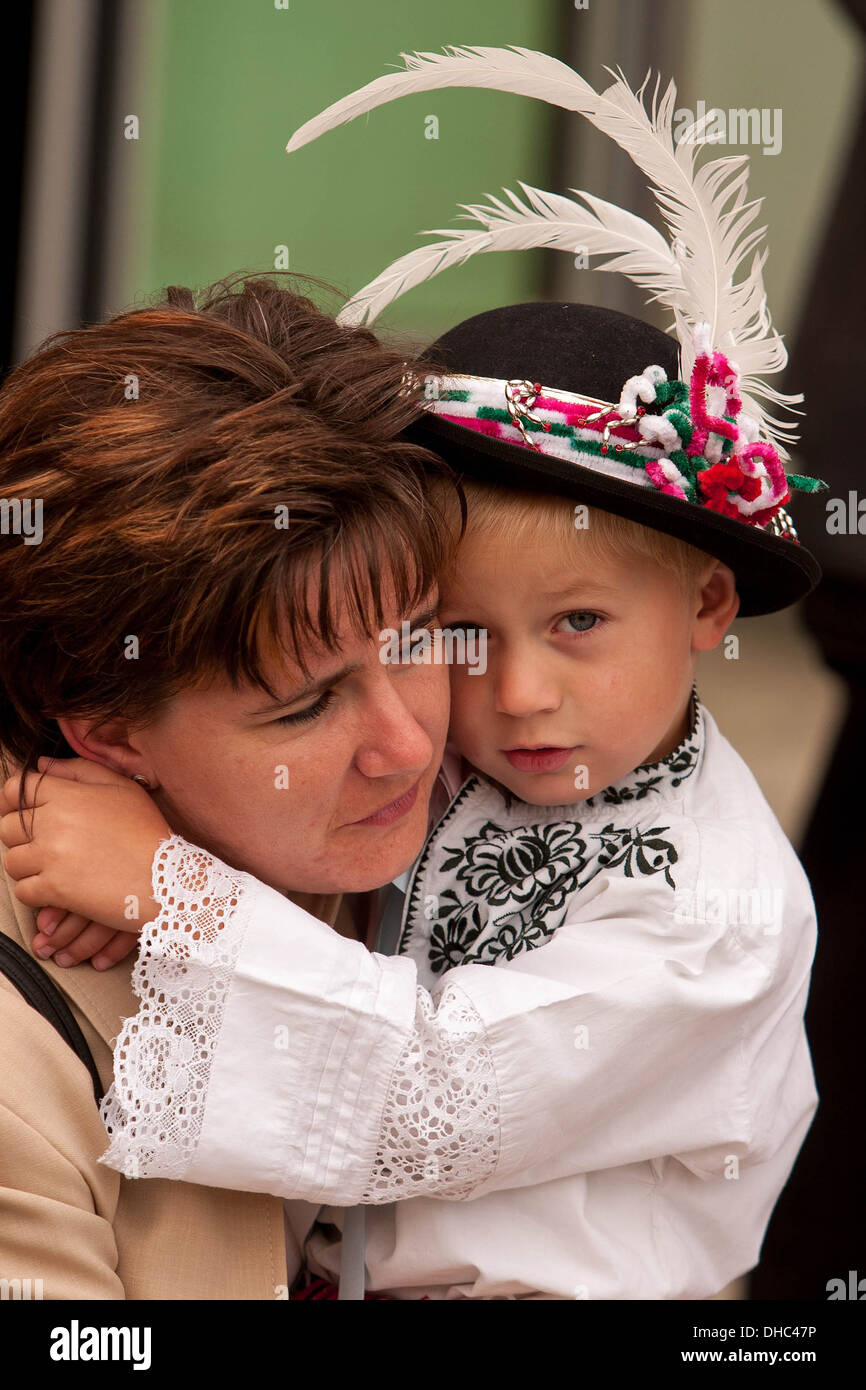 People in folk costumes on a pilgrimage to Zarosice, South Moravia