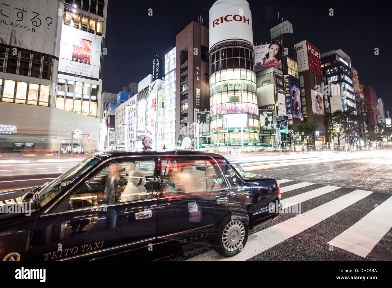 A color photograph of the traffic at night in Tokyo, Japan Stock Photo