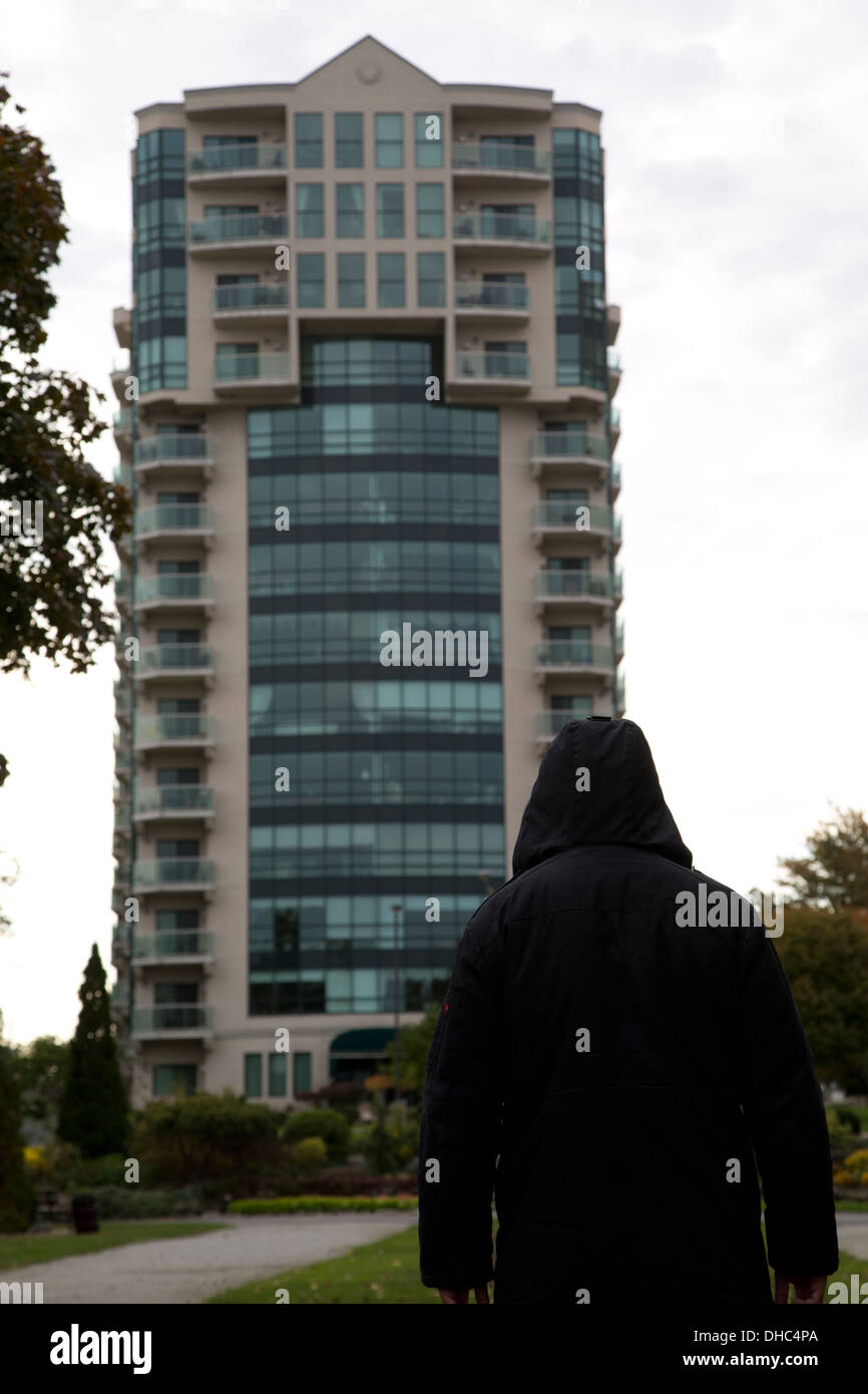 Man standing in front of building Stock Photo Alamy