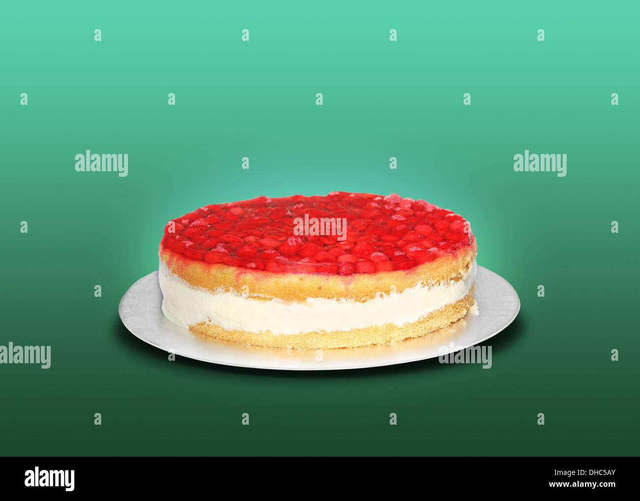 Tasty strawberry cake isolated on a green background Stock Photo - Alamy
