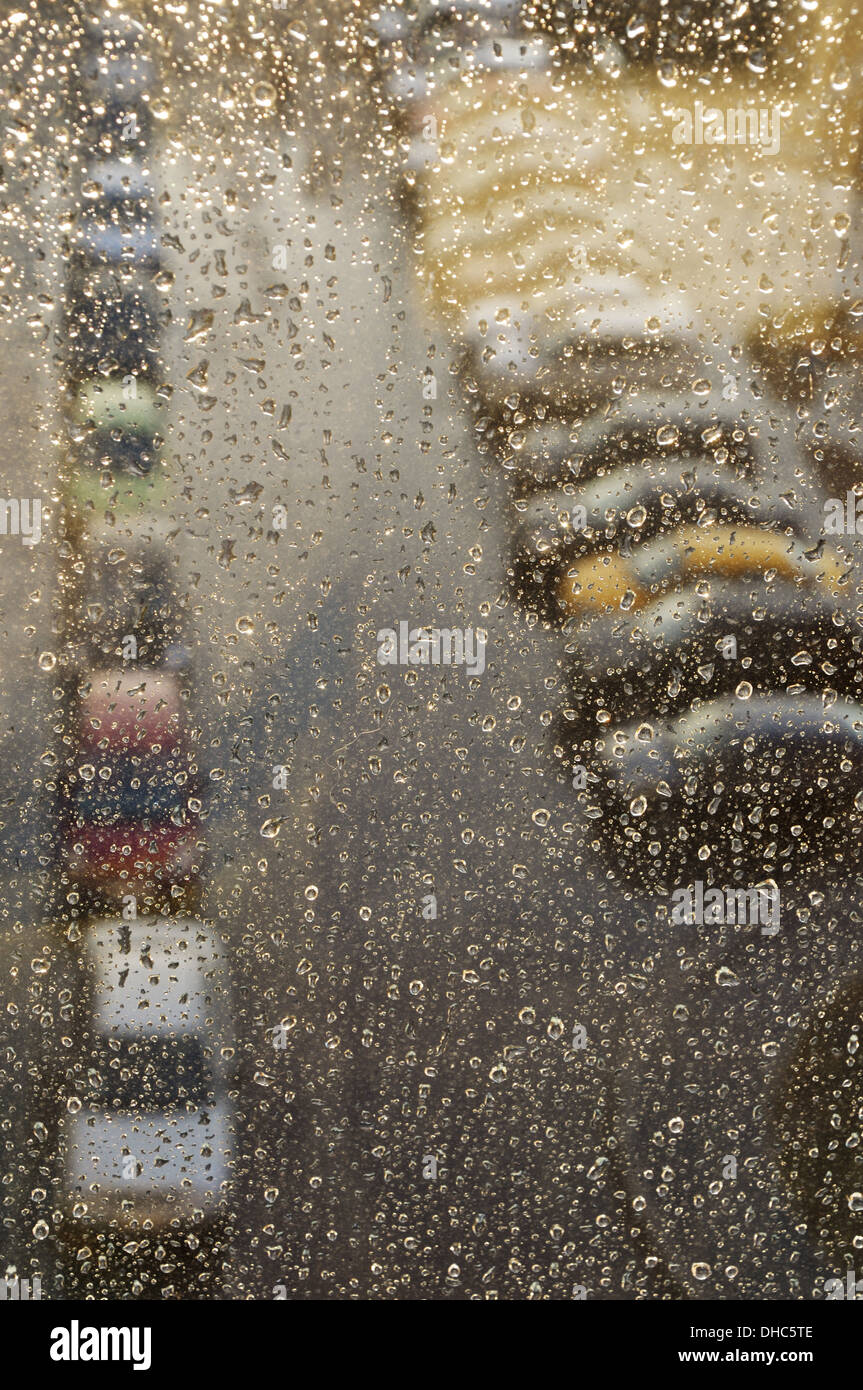 City view through rain window hi-res stock photography and images - Alamy
