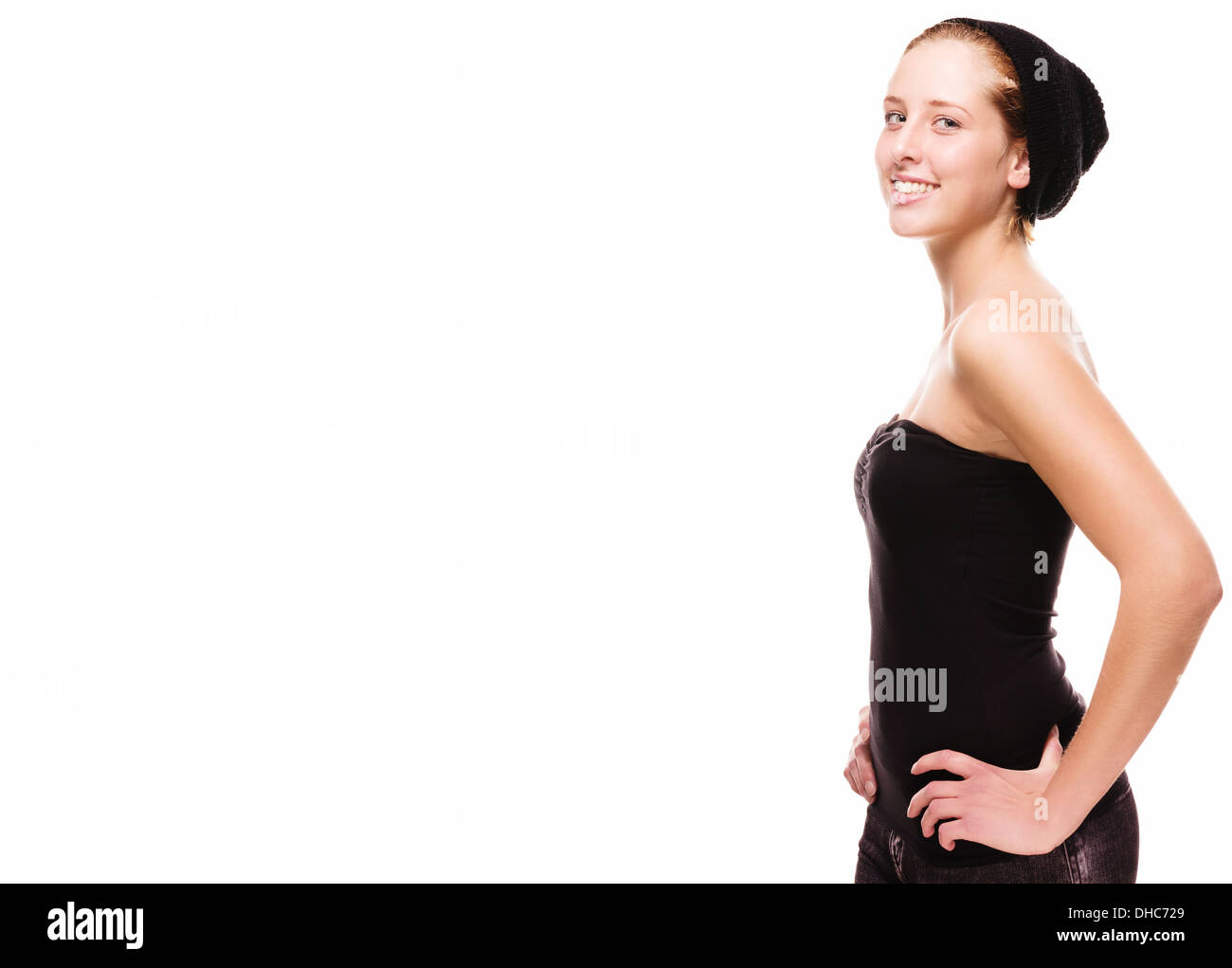 cute happy girl wearing a black cap on white background Stock Photo