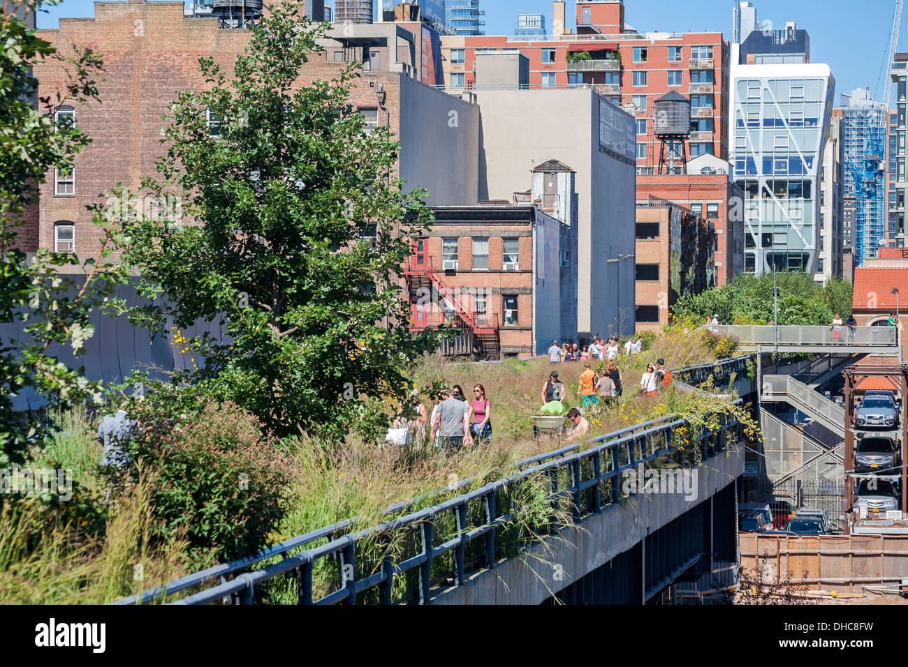 Pedestrians walking along the High LIne Park in Manhattan, New York ...