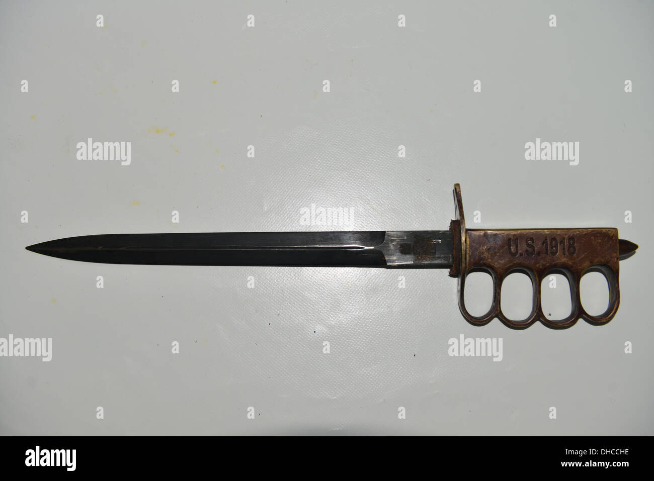 A US army issued 1918 issue army knife complete with knuckle duster and