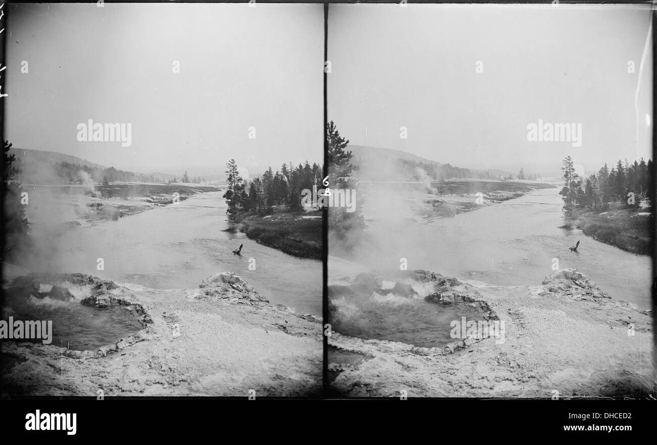 The upper basin near the Grand Canyon of Yellowstone National Park offers stunning views of the park’s geological features. The basin is known for its colorful thermal features, including hot springs, fumaroles, and geysers, contributing to the park's geothermal activity. Stock Photo