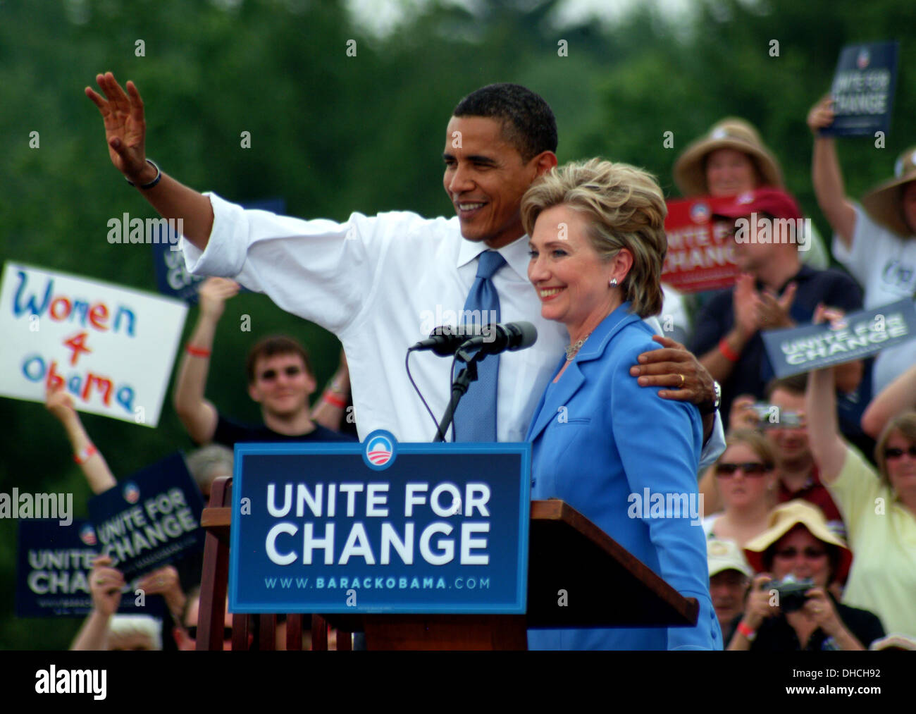 Barack Obama hugs Hillary Clinton and waves to the crowd during a campaign rally in Unity, New Hampshire, June 27, 2008. Stock Photo