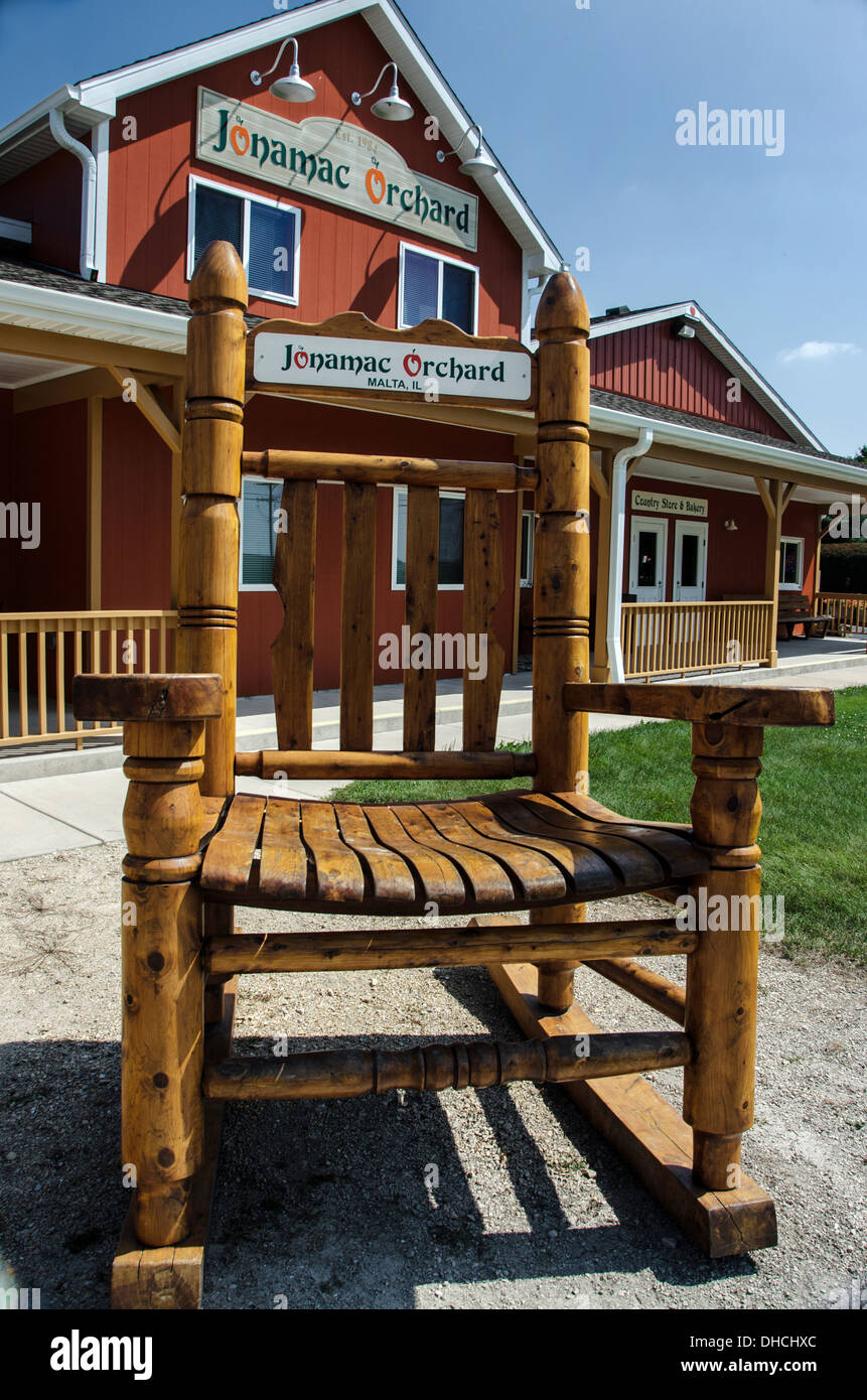 Large chair in front of Jonamac Orchard near Malta Illinois, a town along the Lincoln Highway Stock Photo