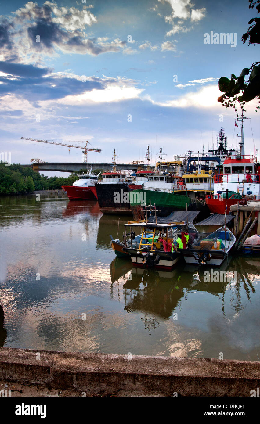 fast crew boat and anchor handling boat stand by at river waiting for instruction Stock Photo