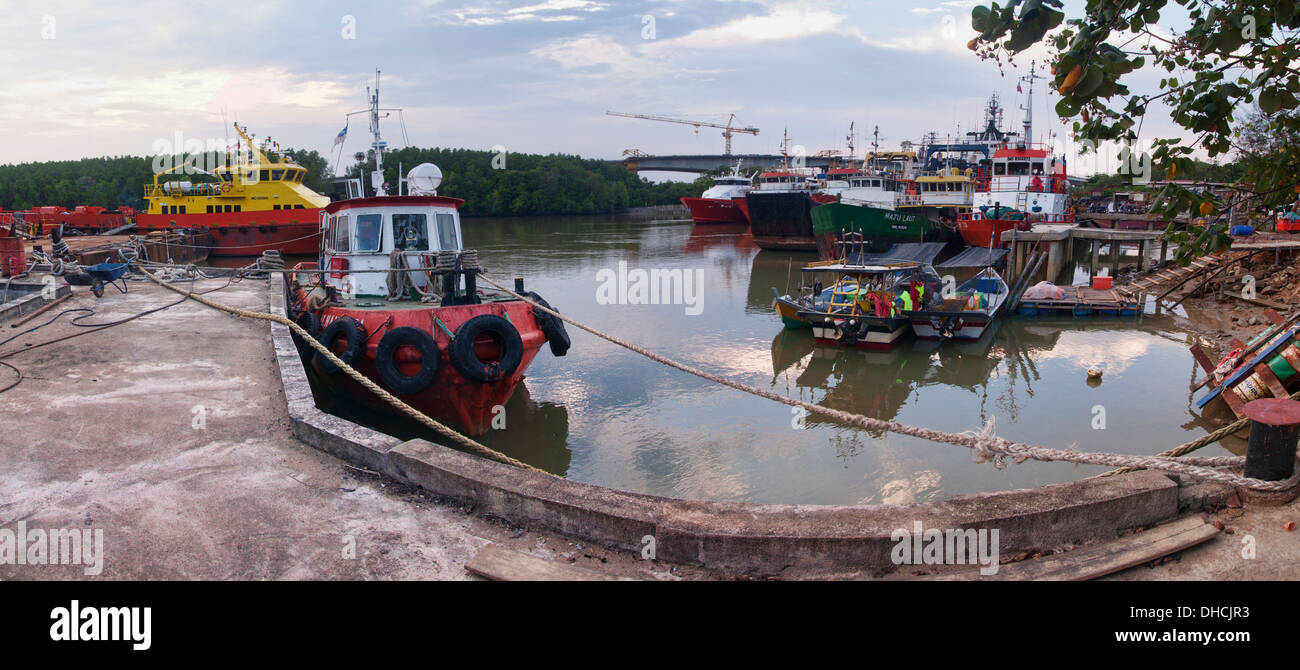 fast crew boat and anchor handling boat stand by at river waiting for instruction Stock Photo
