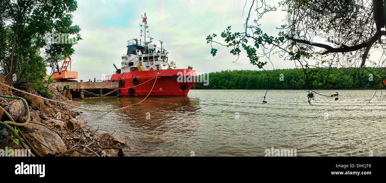 offshore supply boat along side at dry dock industries area for ...