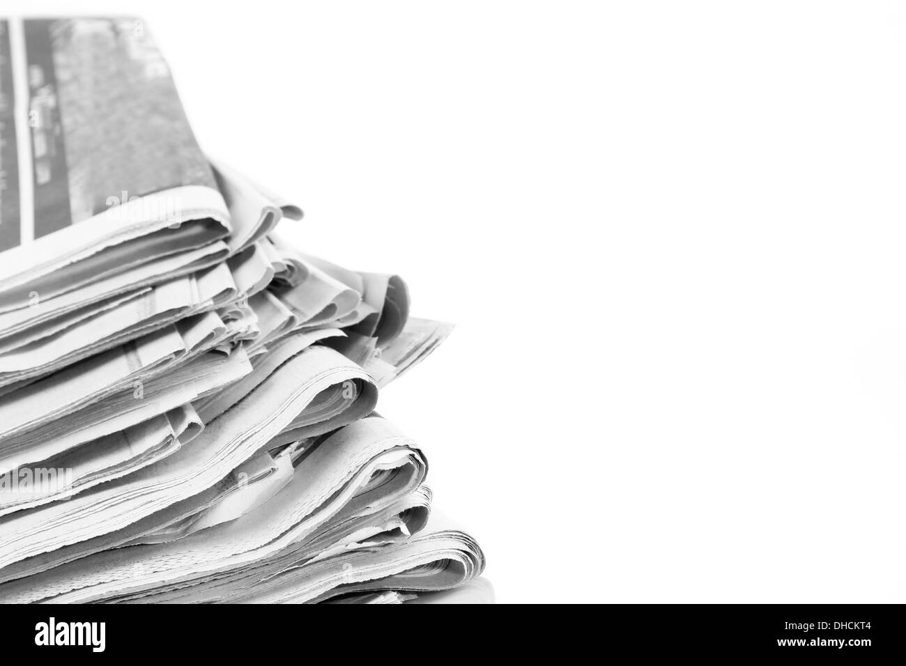 Closeup Of Newspapers On Plain Background Stock Photo Alamy
