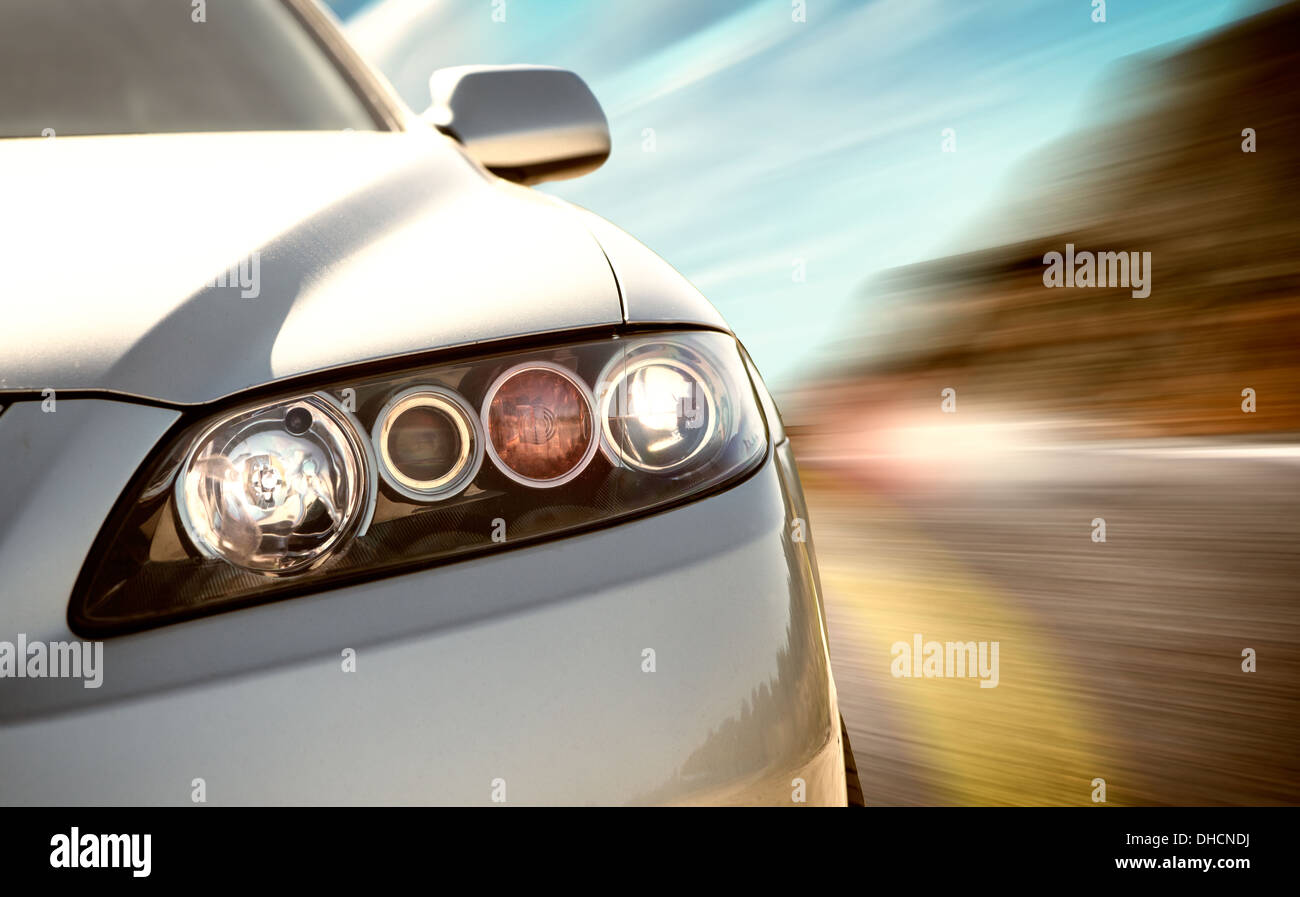 A car driving on a motorway at high speeds, overtaking other cars Stock