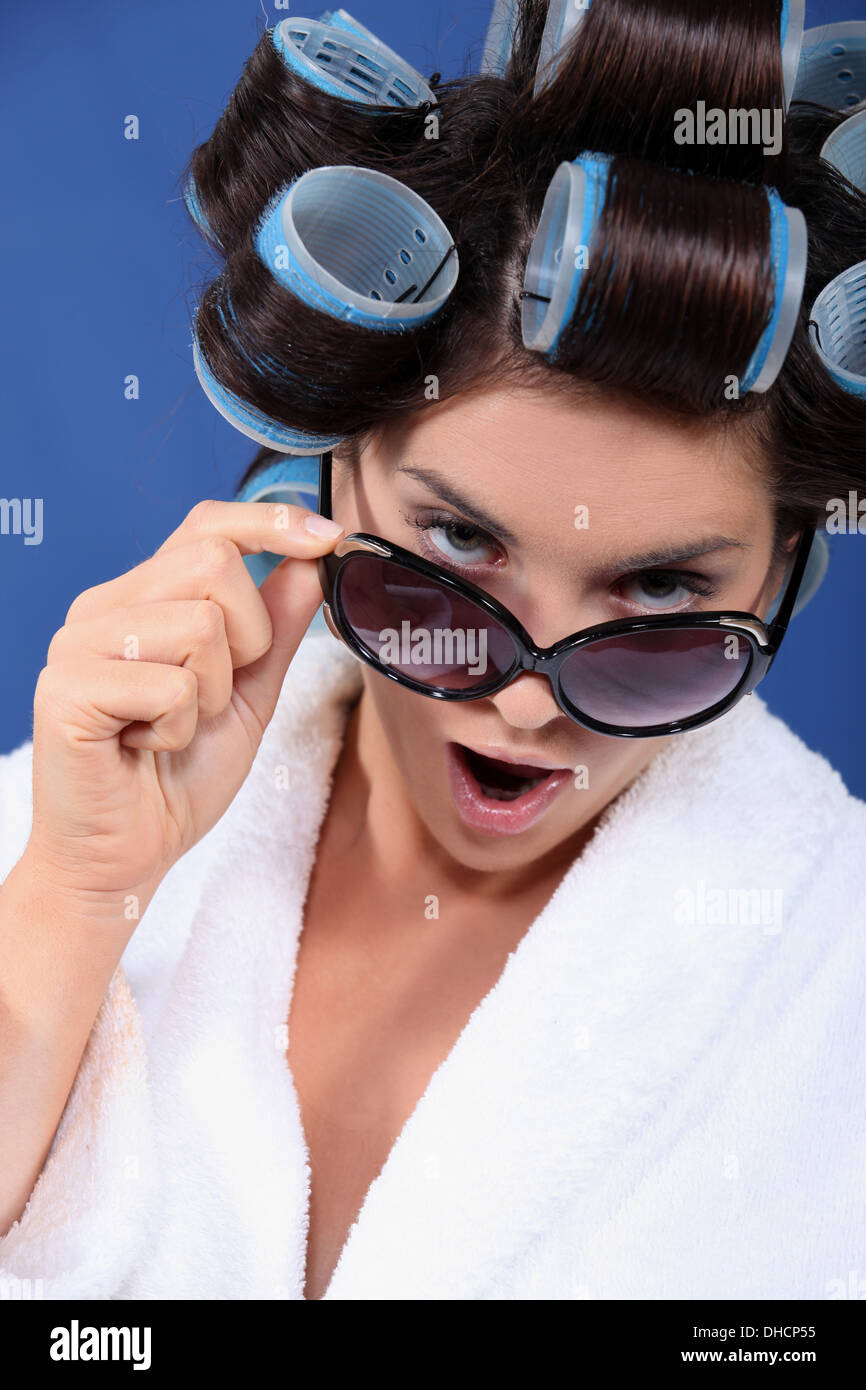 Young woman hair curlers hot hi-res stock photography and images - Alamy