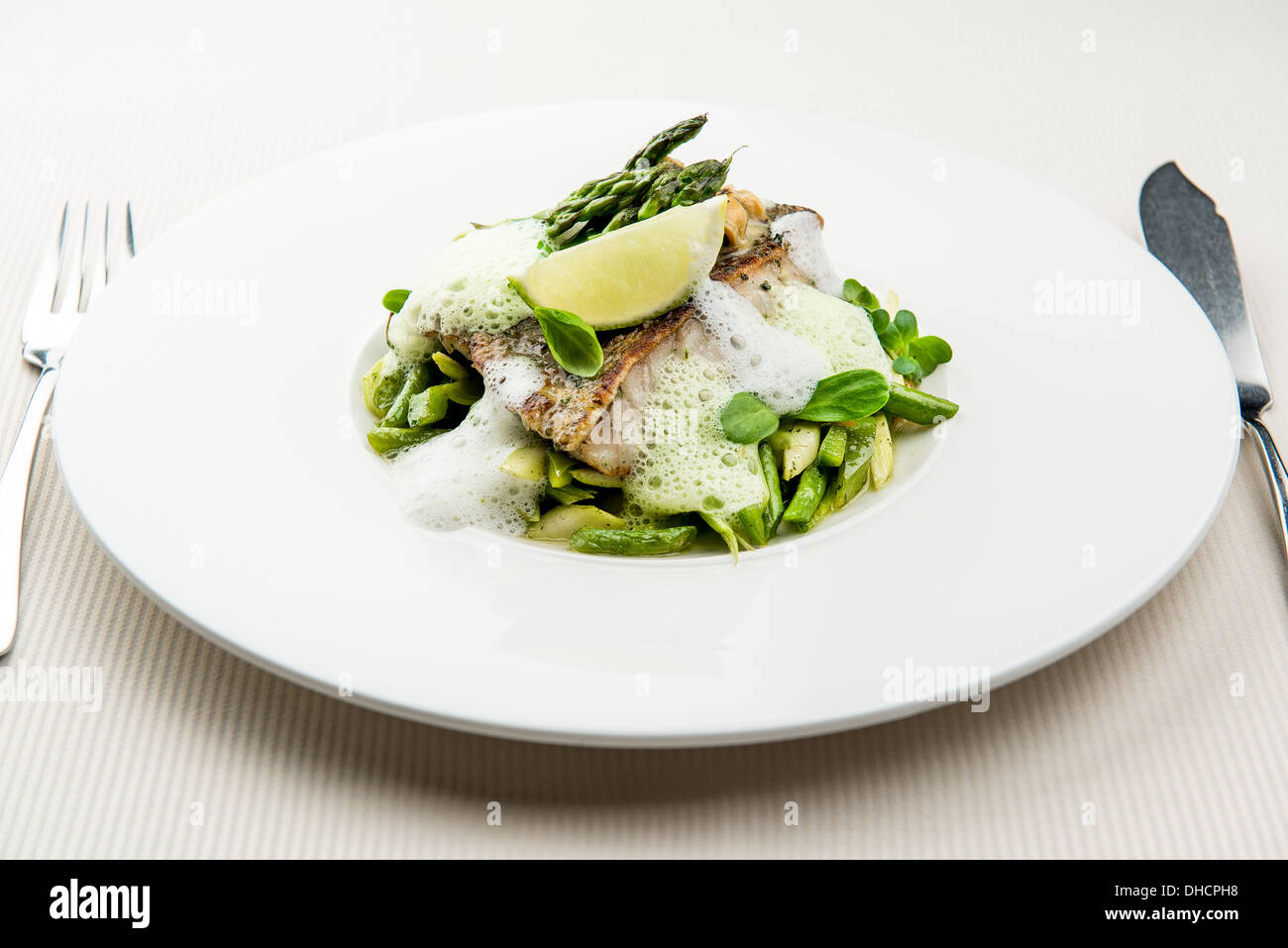 Sea bass fillet with asparagus Stock Photo Alamy