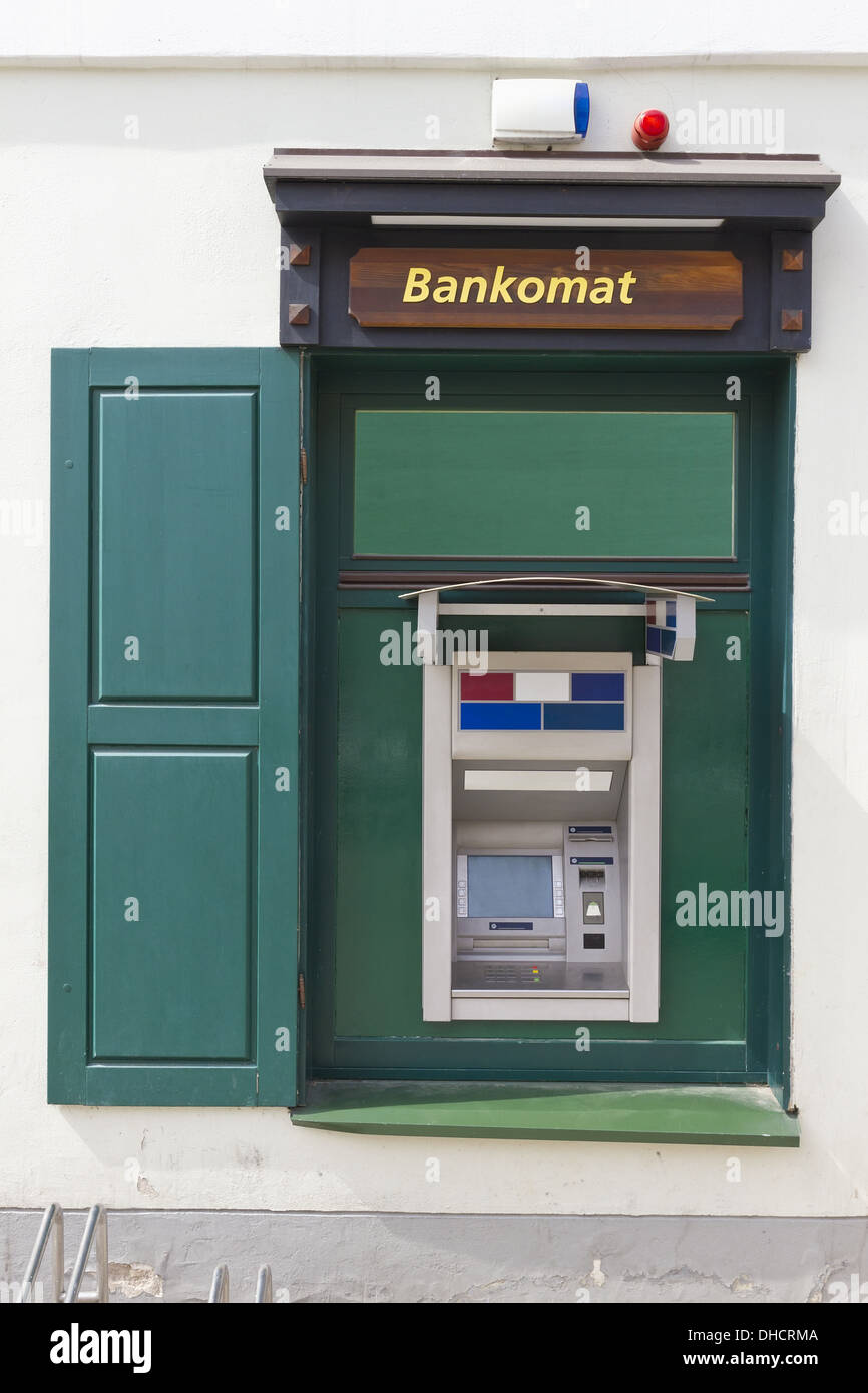 Green ATM cash dispense   device Stock Photo