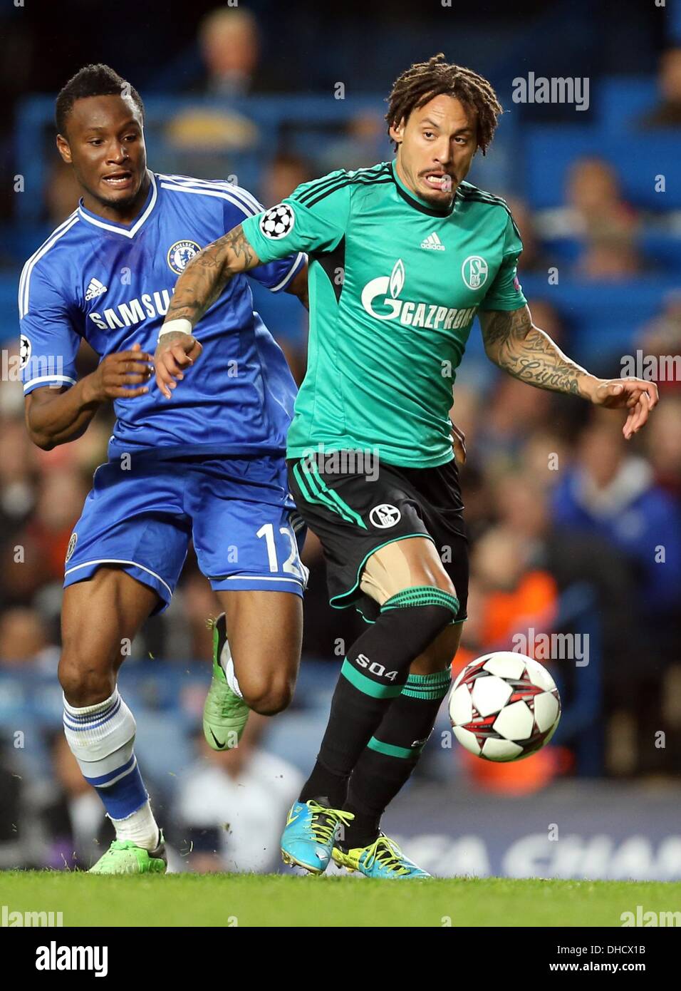 London, Britain. 06th Nov, 2013. Schalke's Jermaine Jones (R) and John Obi Mikel (L) of Chelsea vie for the ball during the UEFA Champions League group E soccer match between Chelsea FC and FC Schalke 04 at Stamford Bridge Stadium in London, Britain, 06 November 2013. Photo: Friso Gentsch/dpa/Alamy Live News Stock Photo